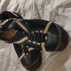 Navy blue with peach/white accents. Used but great shape. Women's 8m